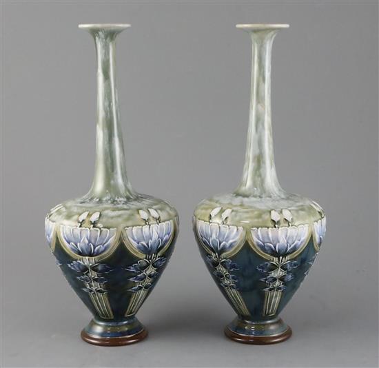 Eliza Simmance for Royal Doulton, a pair of Art Nouveau lily design bottle vases, c.1910, 30cm